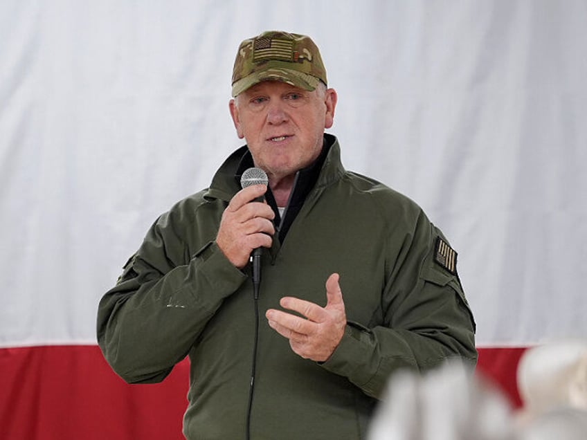 Incoming U.S. Border Czar Tom Homan talks to state troopers and national guardsmen who are