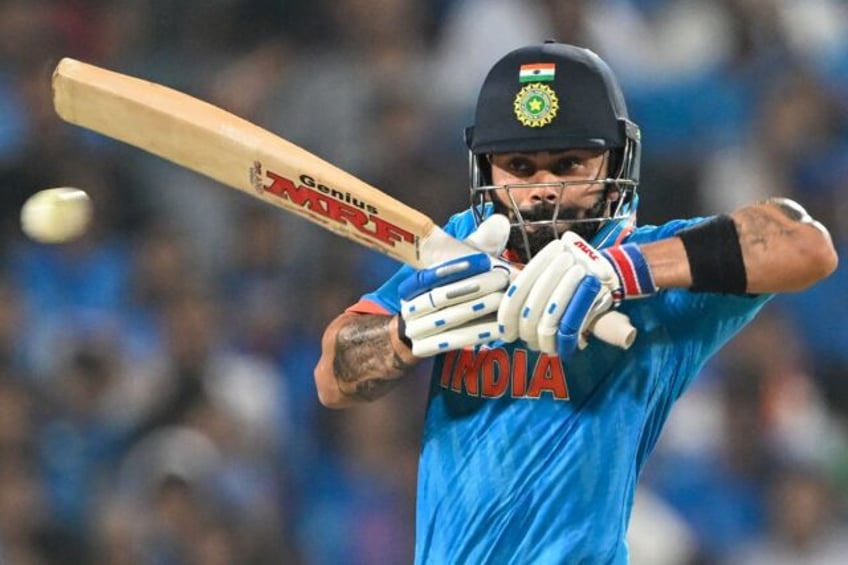 ton up kohli stars as india overwhelm bangladesh in world cup