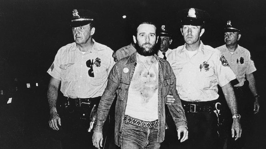 George Carlin getting arrested by two cops