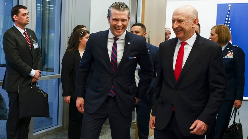 United States Secretary of Defense Pete Hegseth, left, walks with Britain's Defense Secretary John Healey prior to a bilateral meeting on the sidelines of a NATO defense ministers meeting at NATO headquarters in Brussels, on Feb. 12.