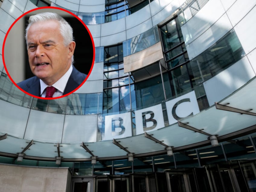 BBC journalist Huw Edwards speaks in front of a camera in Downing Street in central London