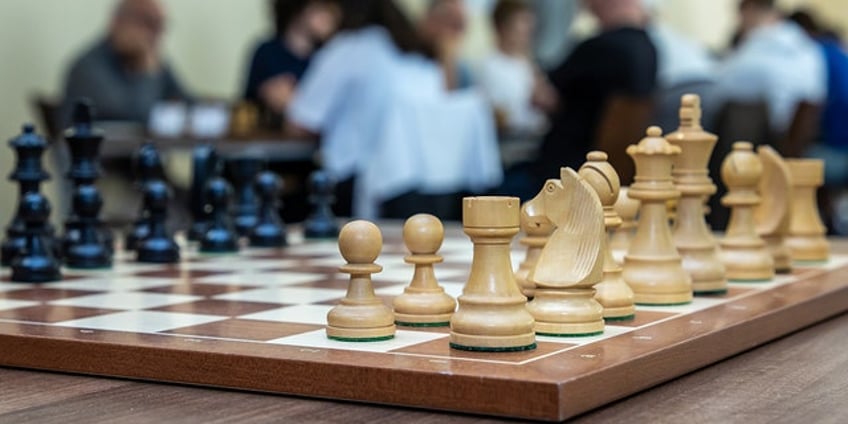 top international chess federation bars transgender females from competing in womens events