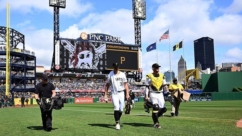 Skenes walking on field