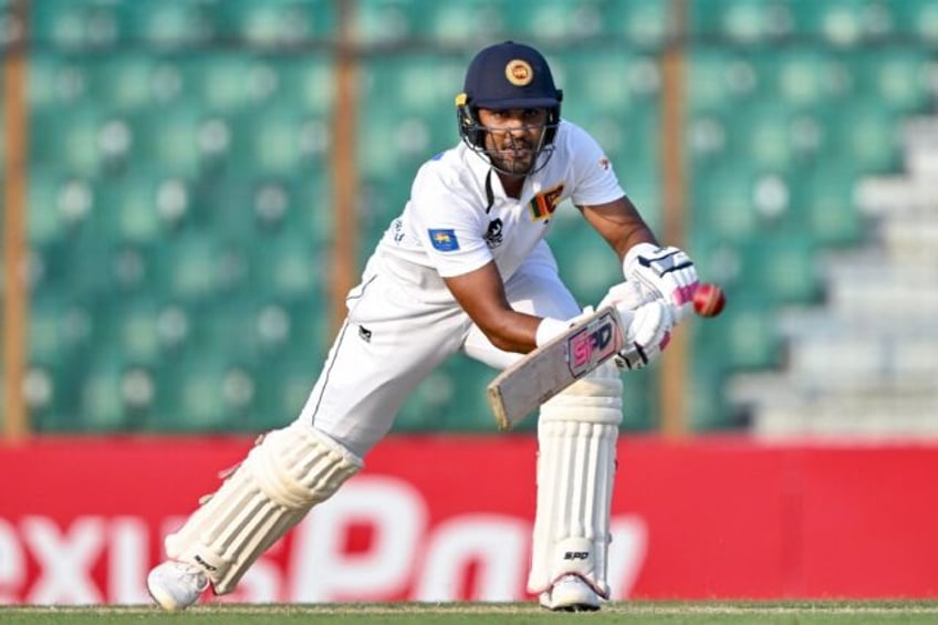 Sri Lanka's Dinesh Chandimal plays a shot during the first day of the second cricket Test