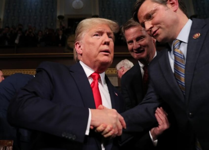 US President-elect Donald Trump (left) gave Mike Johnson a ringing endorsement as the Loui