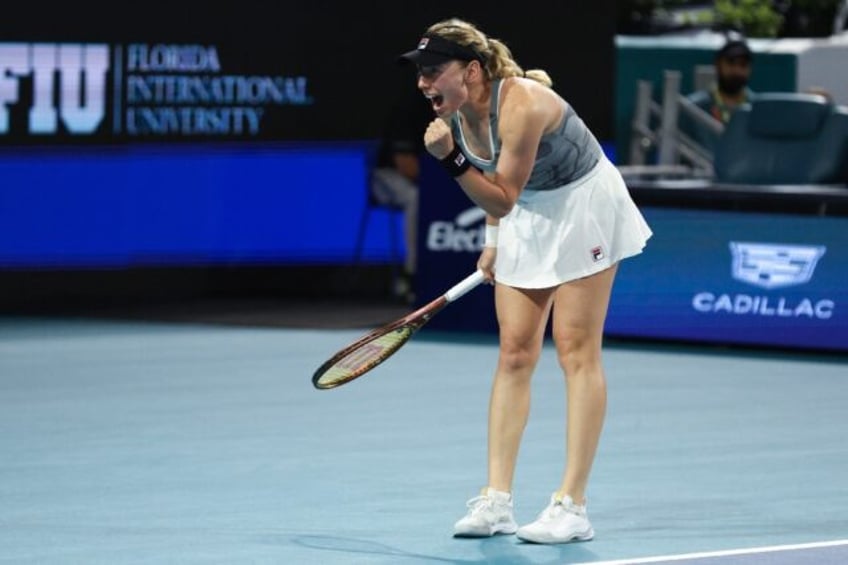 Ekaterina Alexandrova reacts after upsetting Iga Swiatek at the Miami Open on Monday