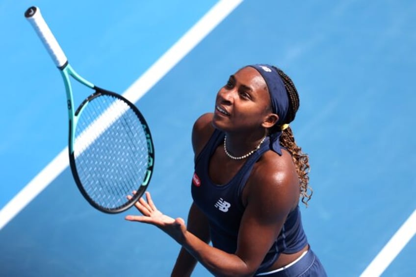 Coco Gauff throws up her racquet during her women's singles semi-final match against compatriot Emma Navarro