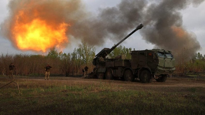 Gunners from 43rd Separate Mechanized Brigade of the Armed Forces of Ukraine fire at Russian position with a 155 mm self-propelled howitzer 2C22 "Bohdana", in the Kharkiv region, on April 21, 2024, amid the Russian invasion in Ukraine. 