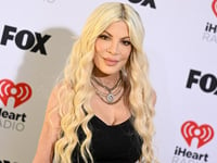 Tori Spelling got plastic surgery at a strip mall when she was 19