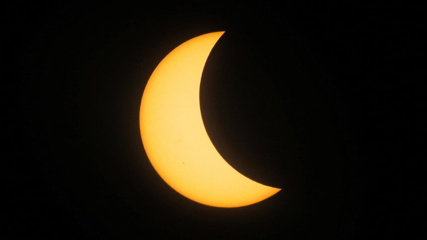 A partial solar eclipse is seen from Mazatlan, Mexico