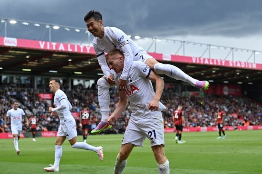 tottenham beat bournemouth to go top of the premier league