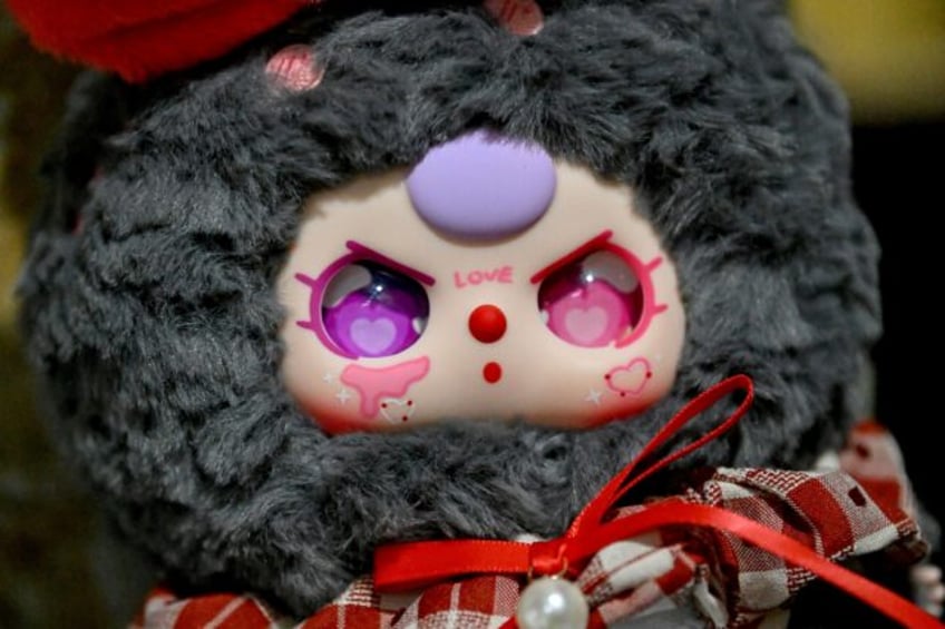 Baby Three doll, with a marking on its cheek that has been claimed to resemble China's so-