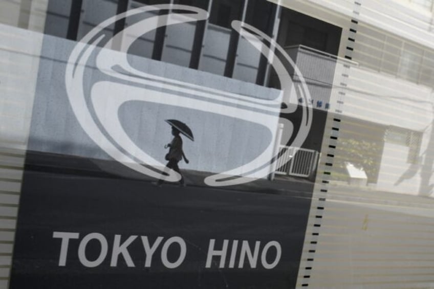 This photo taken in Tokyo in August 2022 shows the logo Japanese truck-maker Hino Motors,