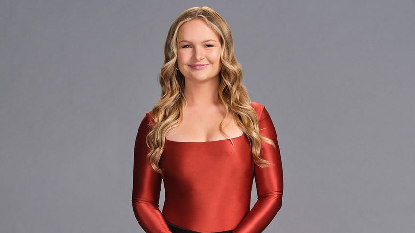 Trace Adkins' daughter Mackenzie wears a red bodysuit