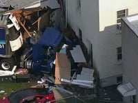 Tractor-trailer driver barrels into back of New Jersey home