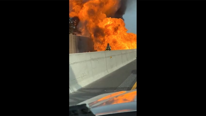 NJ firefighter near flames