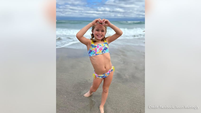 An image of Sloan Mattingly, 7, on the beach. She died when a sand hole collapsed on her. 