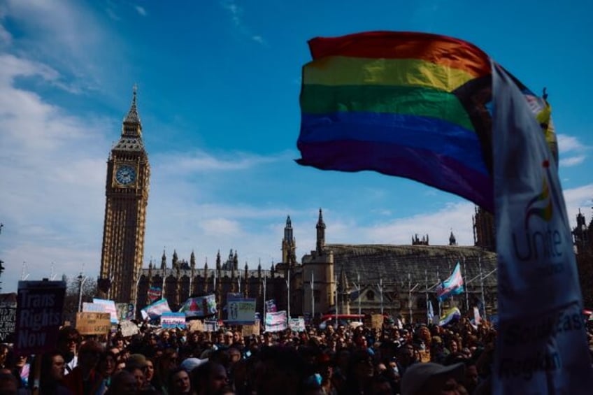 Protesters held up banners with slogans such as 'trans women are women!' and 'trans rights