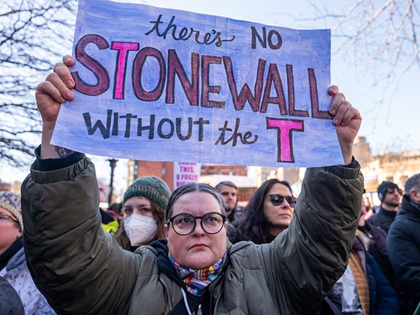 People protest the removal of the word “transgender” from the Stonewall National Monum