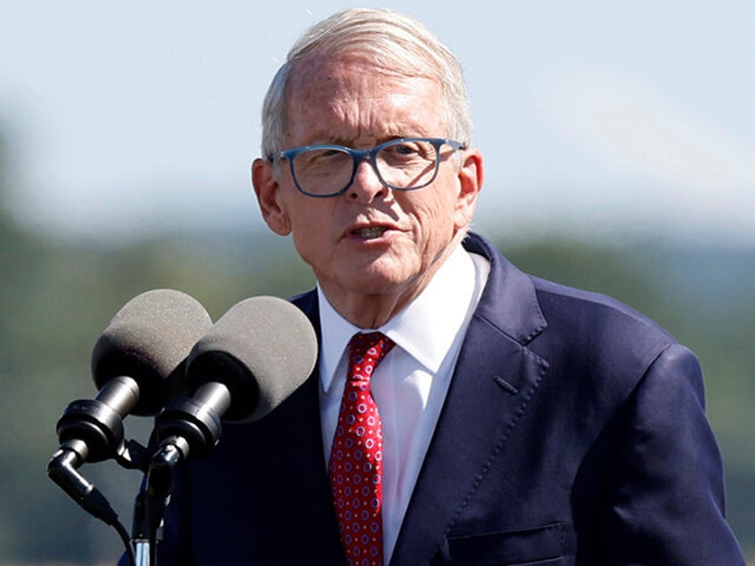 In this file photo from Sept. 9, 2022 Ohio Gov. Mike DeWine speaks during the groundbreaking ceremony for the new Intel semiconductor manufacturing facility in New Albany, Ohio. The Ohio Debate Commission said Wednesday, Sept. 21, 2022, that neither Republican Gov. DeWine nor Senate nominee JD Vance accepted their invitations …