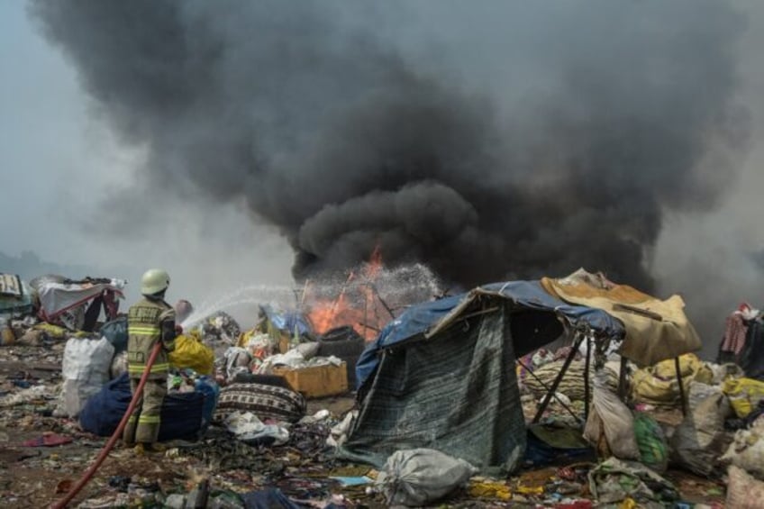 trash fire emergency chokes locals on indonesias java