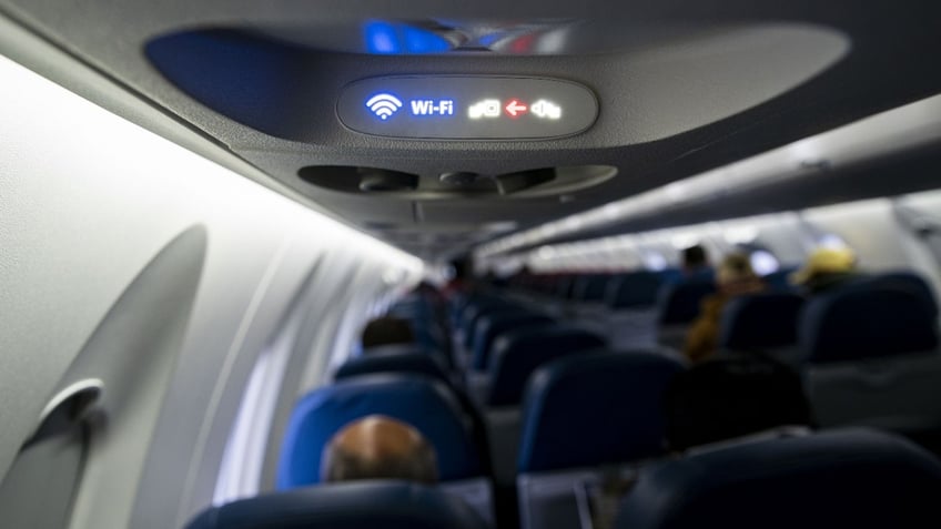 A Wi-Fi sign on a Delta Air Lines plane