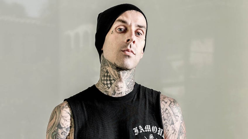 travis barker looking at camera