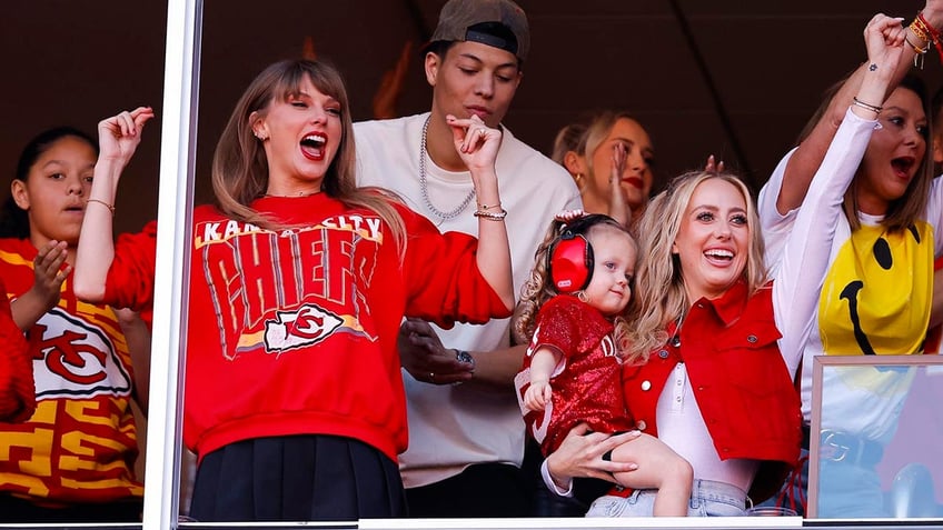 travis kelce and taylor swift exit chiefs stadium hand in hand after dominant win over chargers