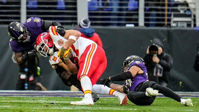 Travis Kelce tackled