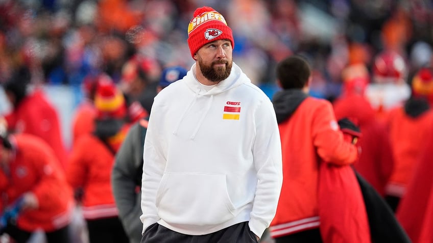 Travis Kelce looks on