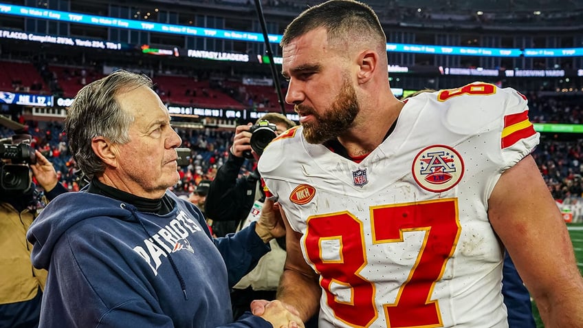 Bill Belichick and Travis Kelce shaking hands