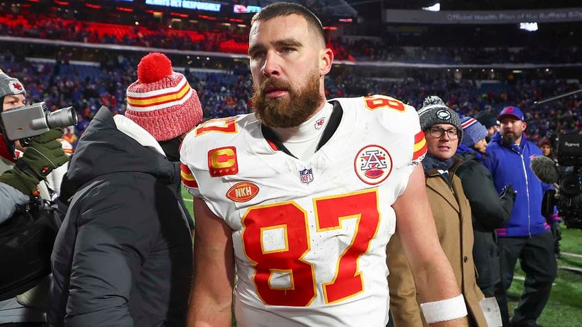 Travis Kelce walks off the field