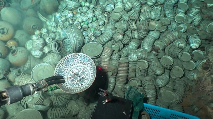 Pottery being excavated from shipwreck