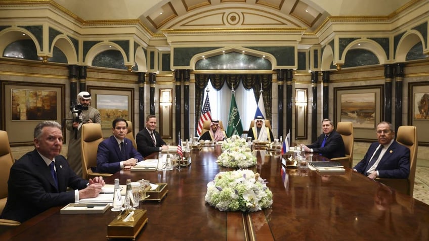 U.S. Secretary of State Marco Rubio, second left, meets with Saudi Foreign Minister Prince Faisal bin Farhan Al Saud, Saudi National Security Advisor Mosaad bin Mohammad Al-Aiban, U.S. National Security Advisor Mike Waltz, third left, U.S. Middle East envoy Steve Witkoff, left, Russian Foreign Minister Sergei Lavrov, right, and Russian President Vladimir Putin's foreign policy advisor Yuri Ushakov, second right, at Diriyah Palace, in Riyadh, Saudi Arabia, Tuesday Feb. 18, 2025. (Evelyn Hockstein/Pool Photo via AP)