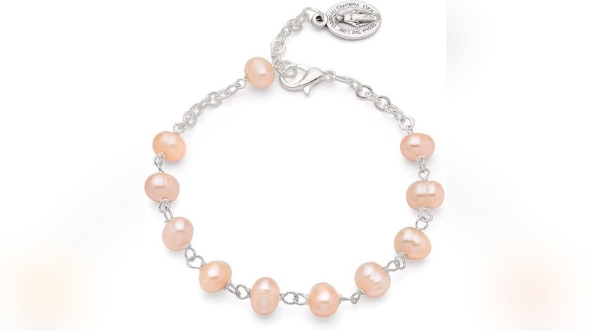 These stylish pearl rosary bead bracelets symbolize faith and tradition in a stylish way.