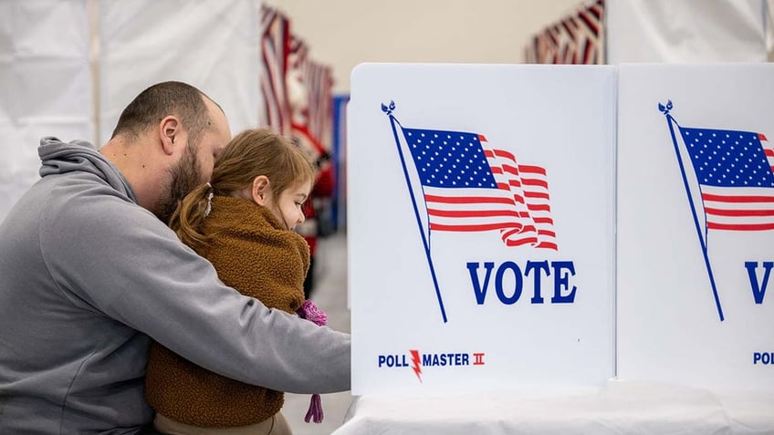 Voters Head To The Polls To Cast Their Vote In The New Hampshire Primary