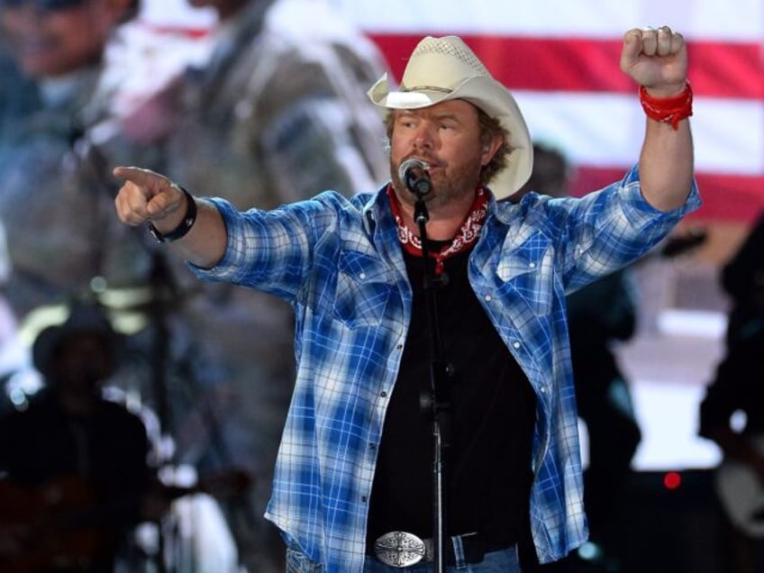 LAS VEGAS, NV - APRIL 07: Recording artist Toby Keith performs during ACM Presents: An All-Star Salute To The Troops at the MGM Grand Garden Arena on April 7, 2014 in Las Vegas, Nevada. (Photo by Ethan Miller/Getty Images for ACM)