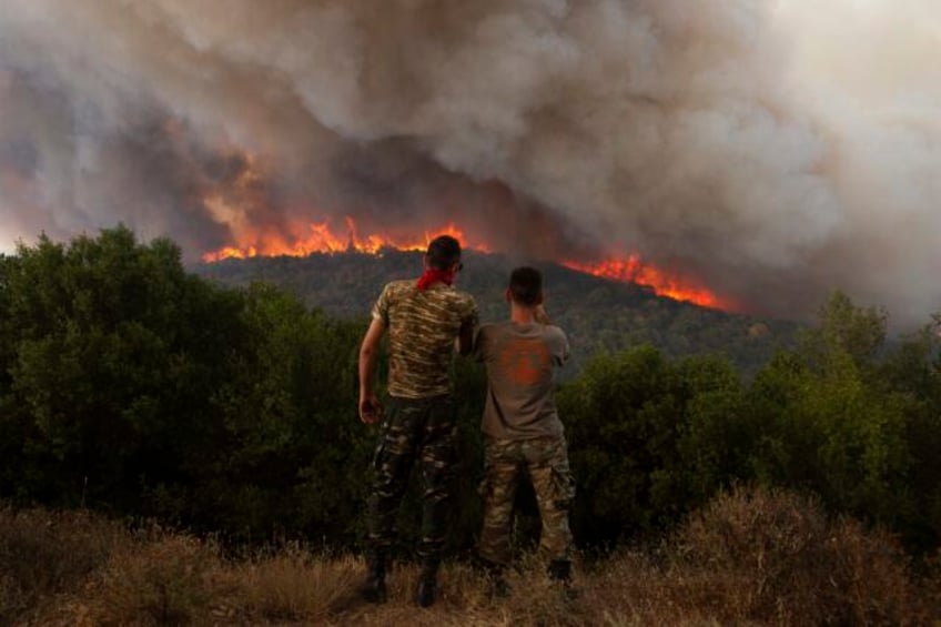 tropical storm hits caribbean wildfires rage in greece what to know about extreme weather now