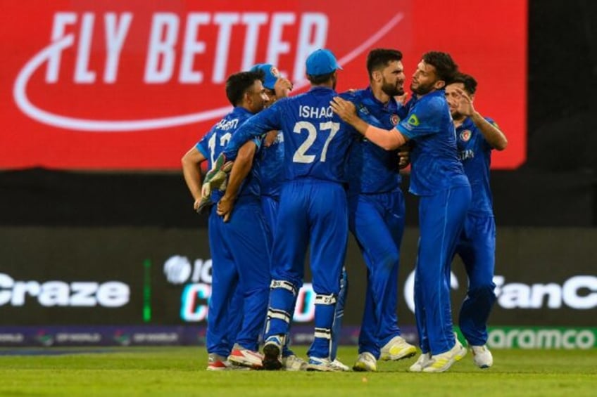 Raw talent: Afghanistan's Naveen-ul-Haq celebrates the dismissal of Bangladesh's Taskin Ah