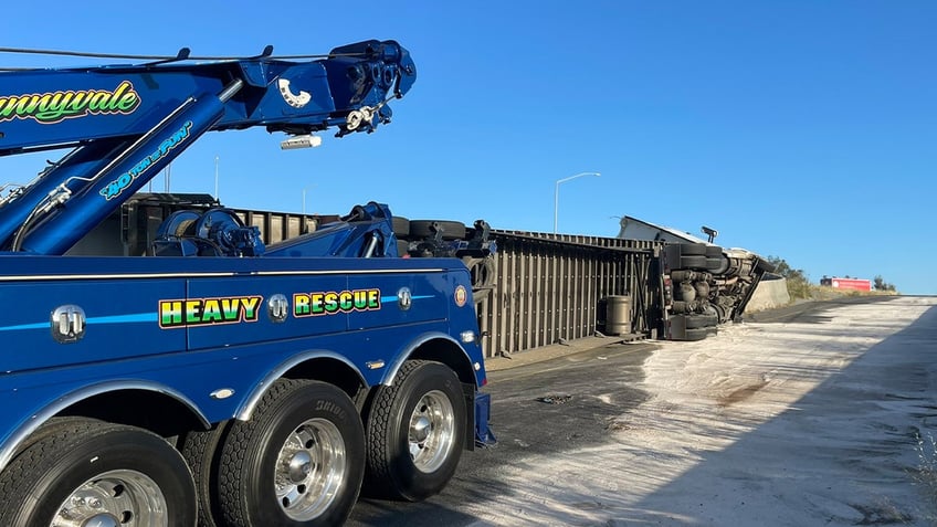 Turned over tractor trailer