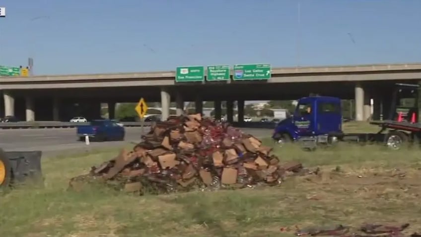 Strawberries in boxes on the side of the road