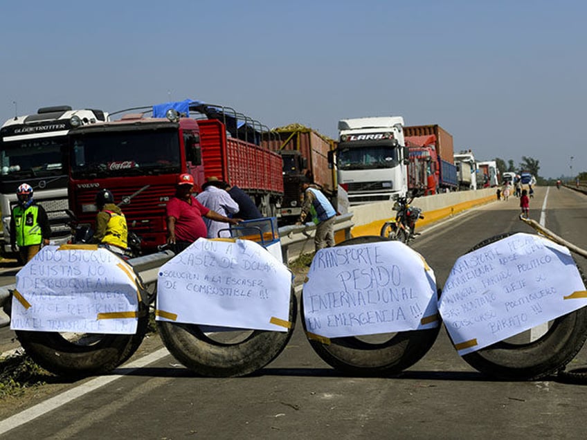 International cargo truckers block a highway connecting Santa Cruz to Cochabamba and La Pa