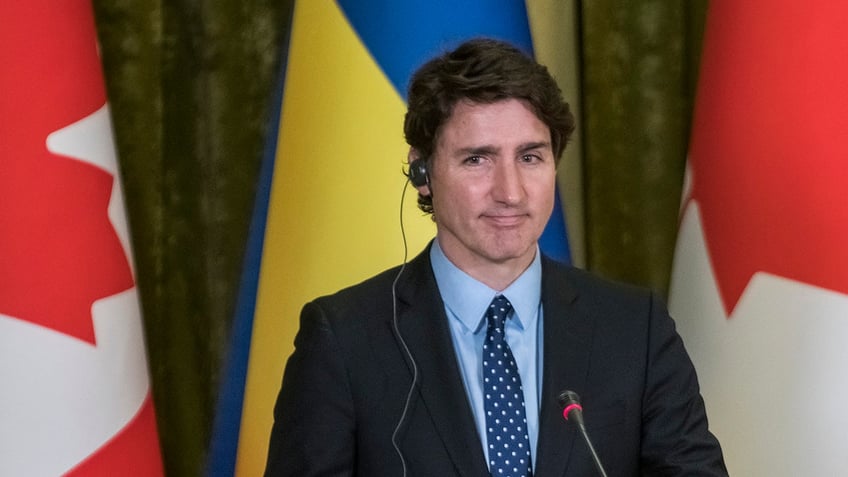 trudeau blames right wing american maga after canadian conservative party votes against ukraine bill