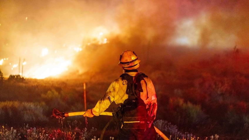 California firefighter battles blaze