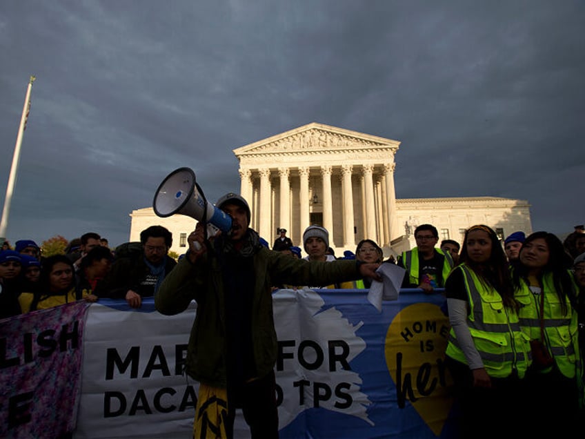Demonstrators arrive in front of the US Supreme Court during the "Home Is Here" March for
