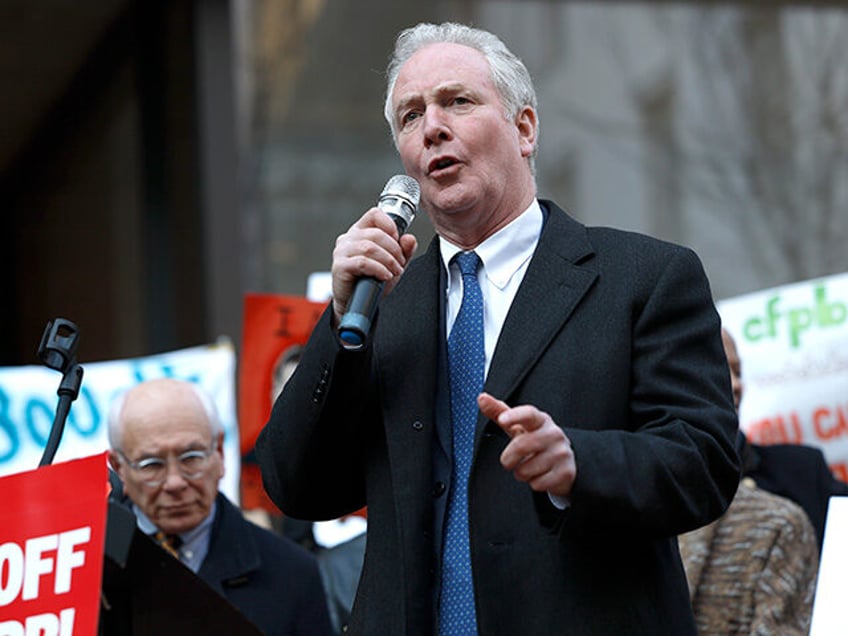 U.S. Sen. Chris Van Hollen (D-MD) speaks at a rally outside Consumer Financial Protection
