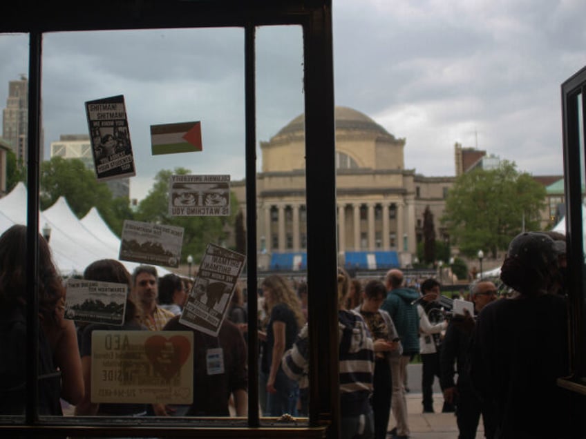 Protesters have put stickers on the doors of Butler Library at Columbia University on May