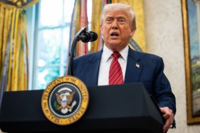 Trump administration stops grants to Harvard, threatens tax exemption