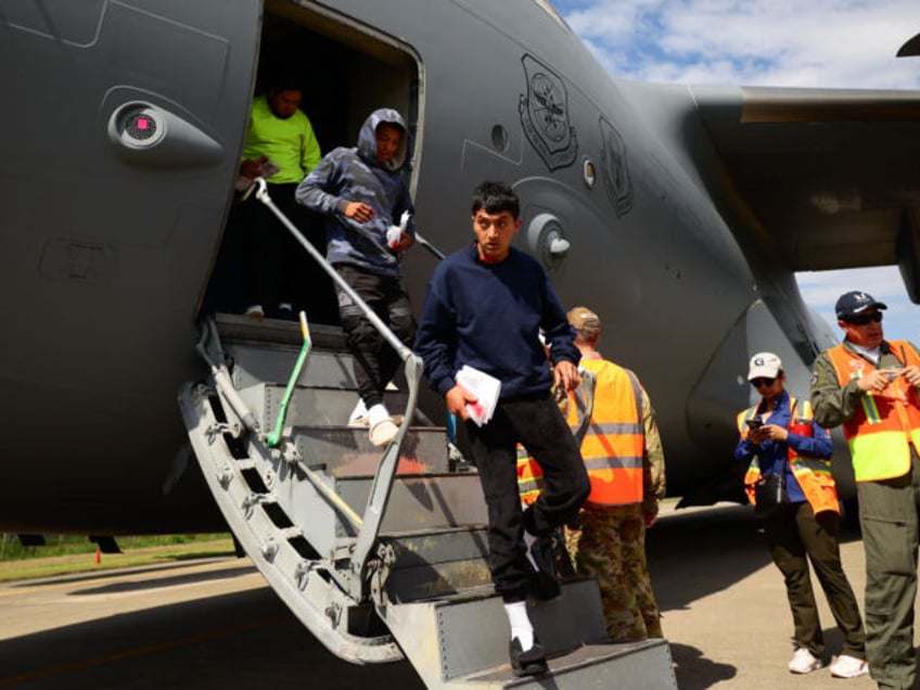 CORTES, HONDURAS - JANUARY 31: Deported migrants arrive from US in a military plane at Ram