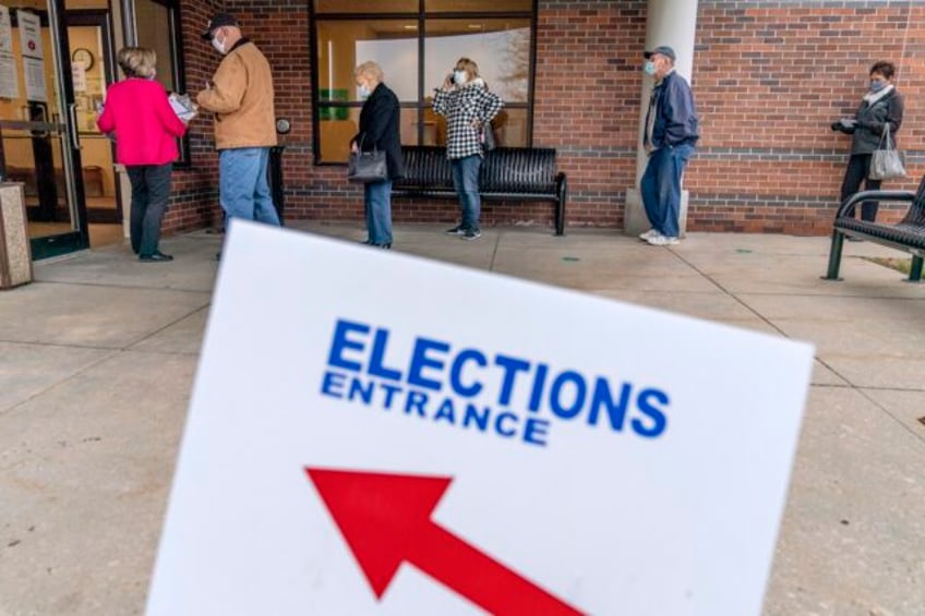 trump allies who orchestrated plan to tamper with voting machines face charges in michigan